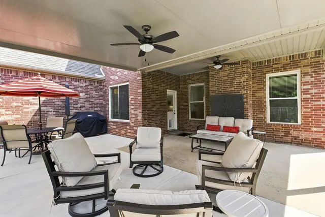 Covered patio with ceiling fans